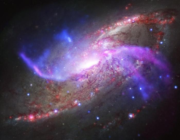 资料图:此前,美国航空航天局公布了一张2300万光年外的星系高清图。该星系巨大黑洞、冲击波、大量气体交织,仿佛一场绝美的烟火秀正在上演。图片来源:NASA官网 资料图:此前,美国航空航天局公布了一张2300万光年外的星系高清图。该星系巨大黑洞、冲击波、大量气体交织,仿佛一场绝美的烟火秀正在上演。图片来源:NASA官网